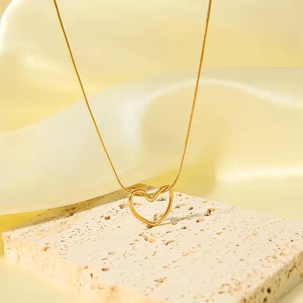 Gold-tone interlocking heart pendant necklace close-up