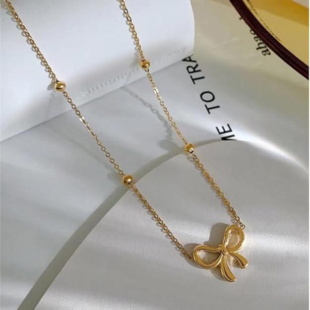 Gold-tone bow pendant necklace product image