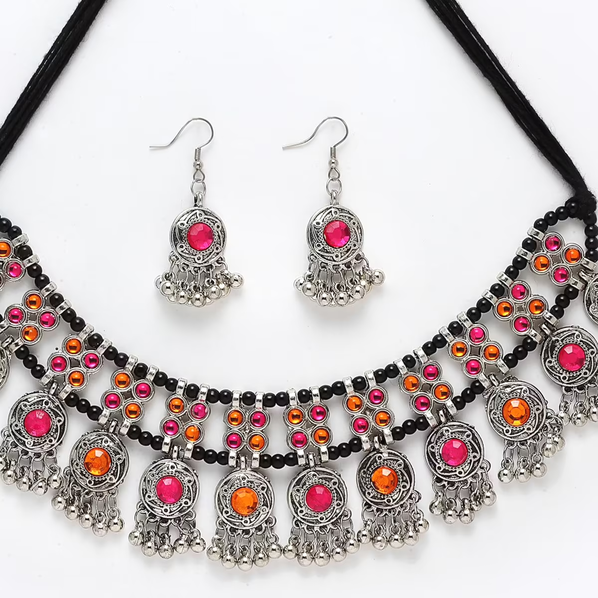 Close-up of oxidised multicolour necklace with black beads