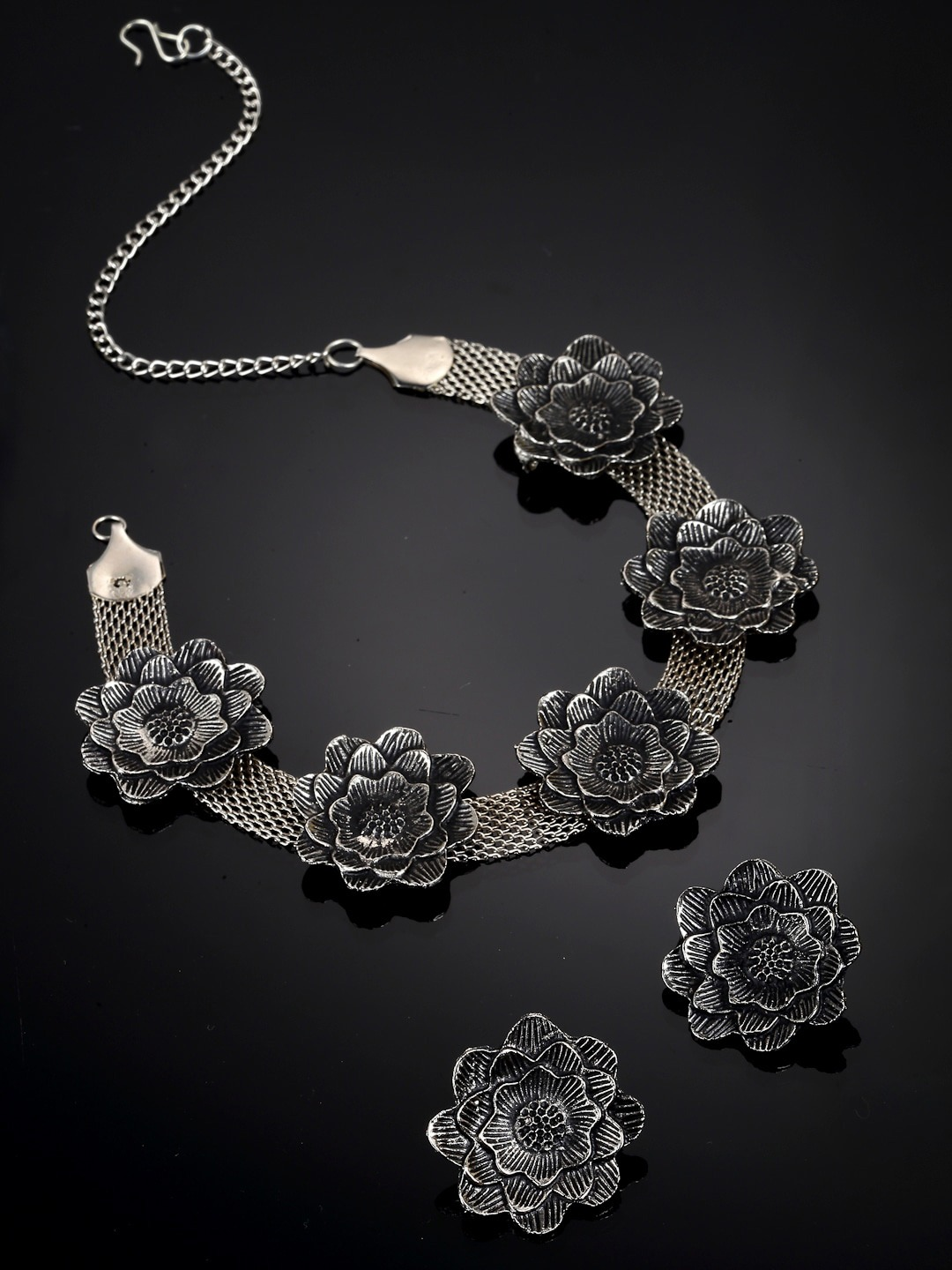 Oxidised silver-tone floral necklace with matching earrings