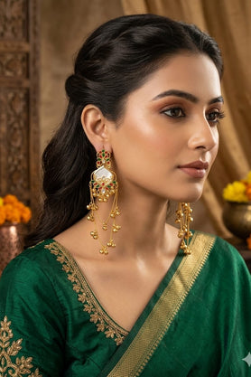 White red and green traditional long jhumka earrings with gold-tone dangling bell charms