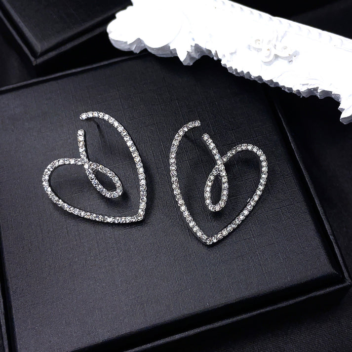 Crystal-pave heart earrings product image