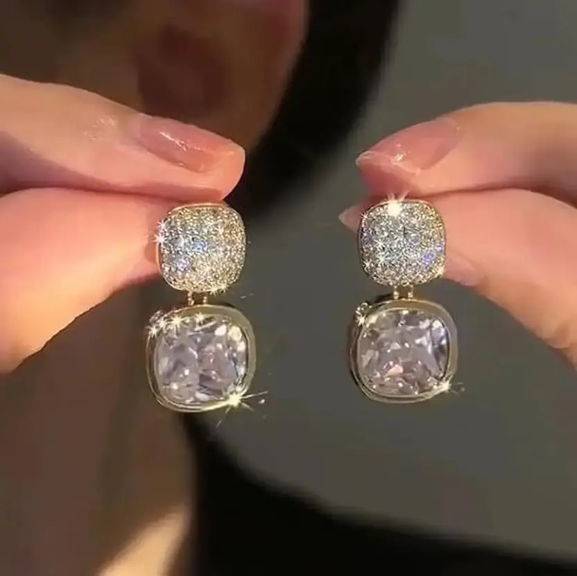 Sparkling cushion crystal drop earrings close-up