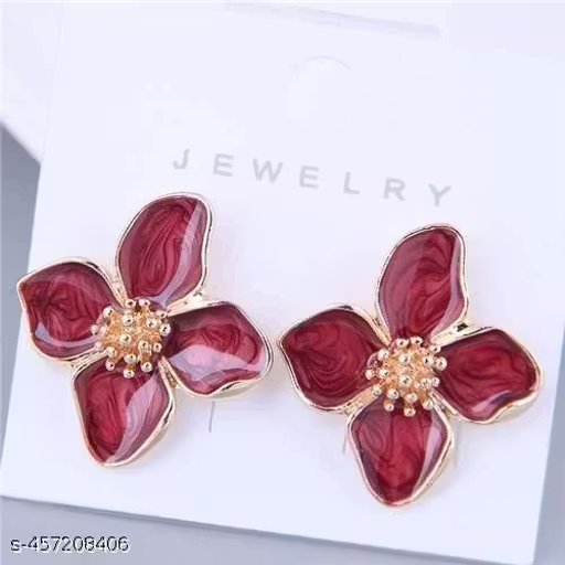 Red floral stud earrings styled in a premium setting