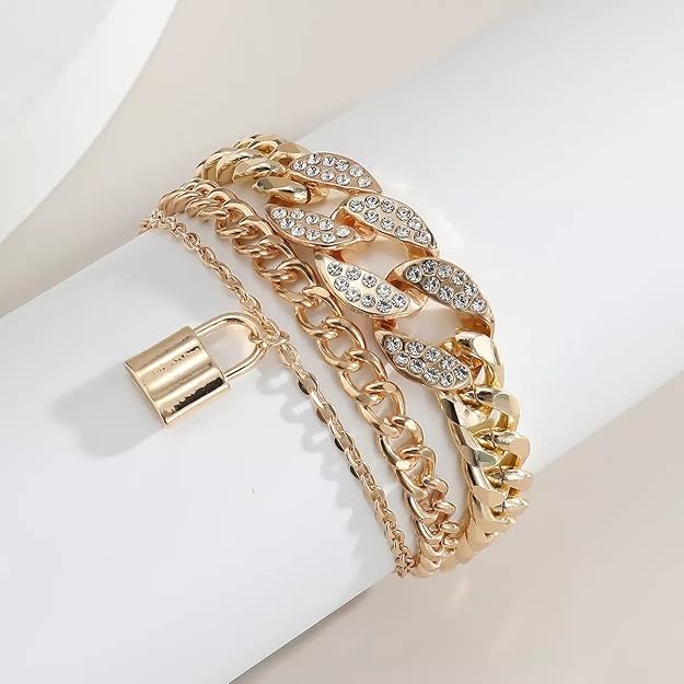 Gold-tone layered bracelet with crystal leaf chain and padlock charm