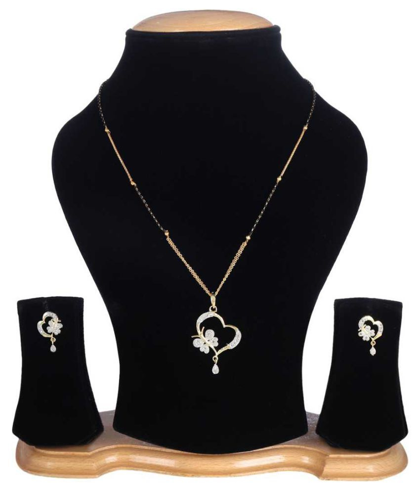 Heart Pendant Necklace and Earrings Jewellery Set on Display