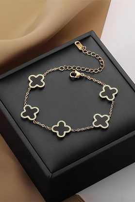 Black clover charm bracelet on display