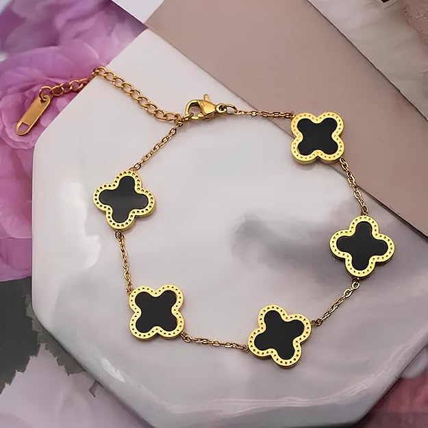 Black clover charm bracelet in jewellery box