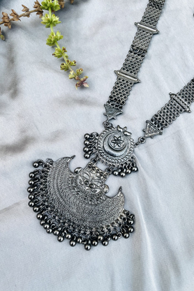 Oxidised silver-tone crescent pendant necklace set with matching earrings