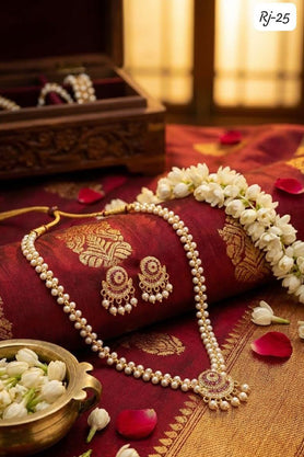 Pearl beaded necklace and matching statement earrings with red and gold detailing